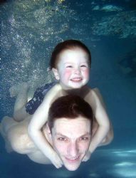 diving piggy back - baby swimming club learning to dive w... by John Akar 